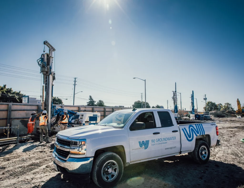 Construction site with drilling equipment. WJ Canada does testing for groundwater systems.